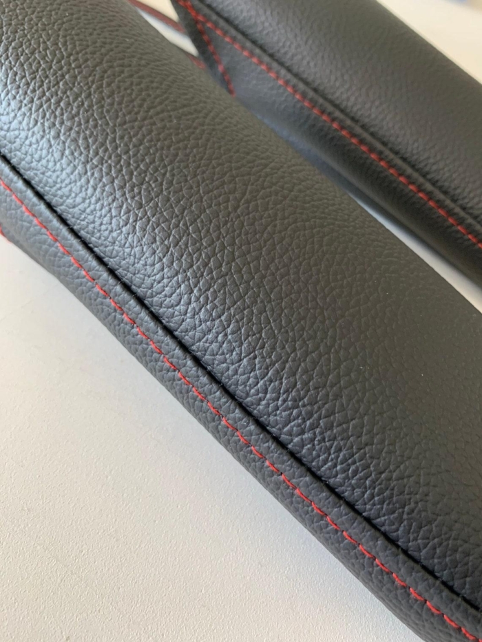 Dodge Grand Caravan armrest covers with red stitches